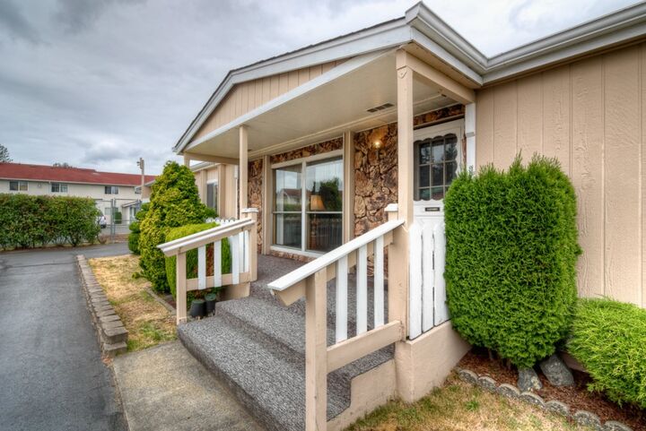 Property Photo:  9810 Alaska St S  WA 98444 