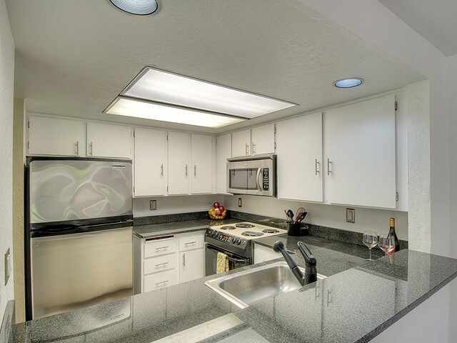 Property Photo:  709 143rd NE 25  WA 98007 