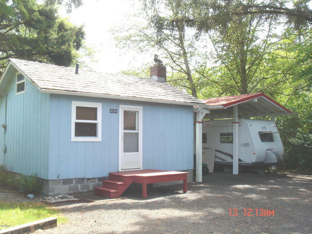 Property Photo:  6250 SW Jetty Avenue  OR 97367 