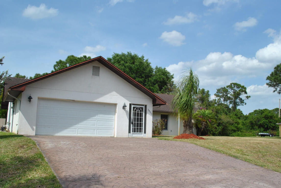 Property Photo:  1801 SW Millikin Avenue  FL 34953 