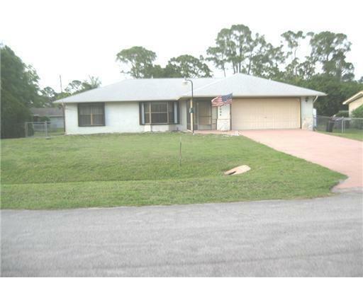 Property Photo:  7004 Deland Avenue  FL 34951 