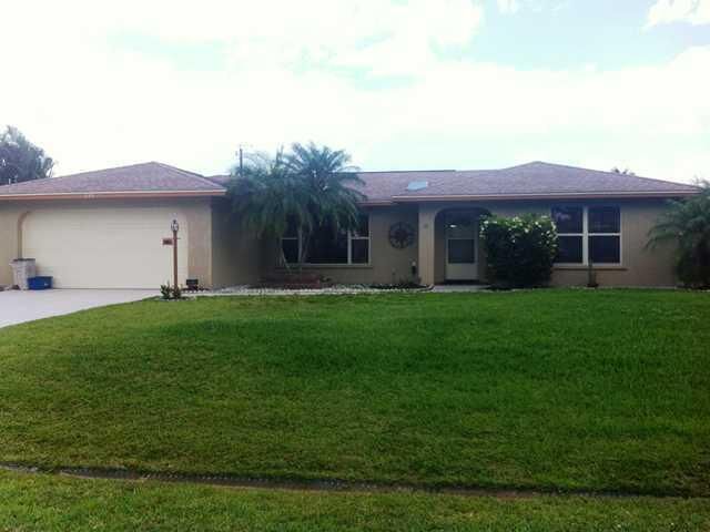 Property Photo:  233 SW Eyerly  FL 34983 