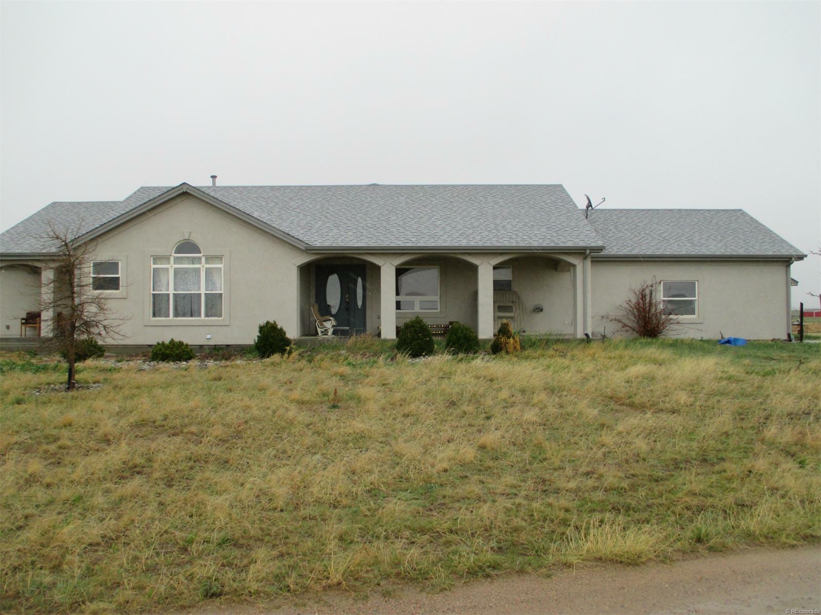 Property Photo:  51200 East 38 Avenue  CO 80102 