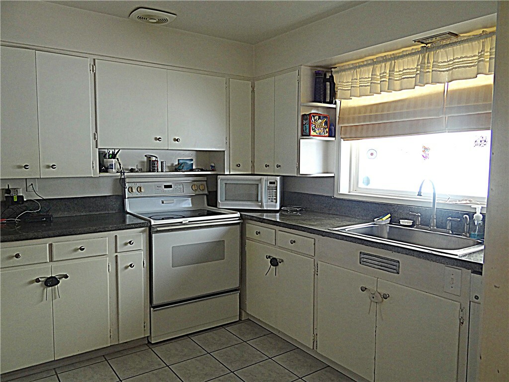 Property Photo:  415 S 94th St  WA 98444 