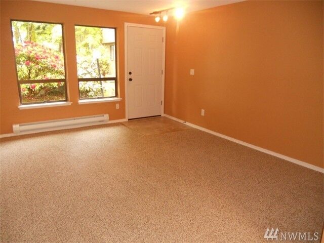 Property Photo:  1101 SW Harrier Cir 106  WA 98277 