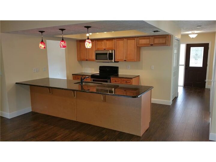 Property Photo: 8535 Woodcrest Drive FL 34668