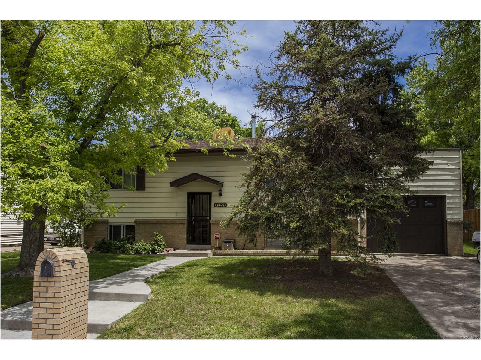 Property Photo:  1164 Olathe Street  CO 80011 