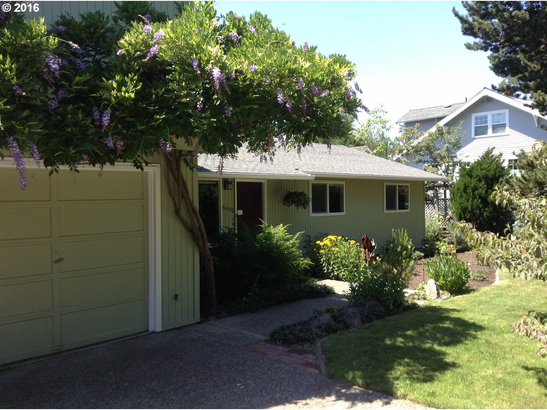 Property Photo:  5801 SW 48th Ave  OR 97221 