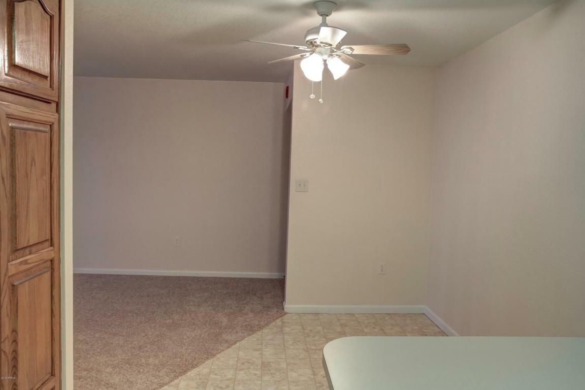 Property Photo:  17404 N 99th Avenue 208  AZ 85373 