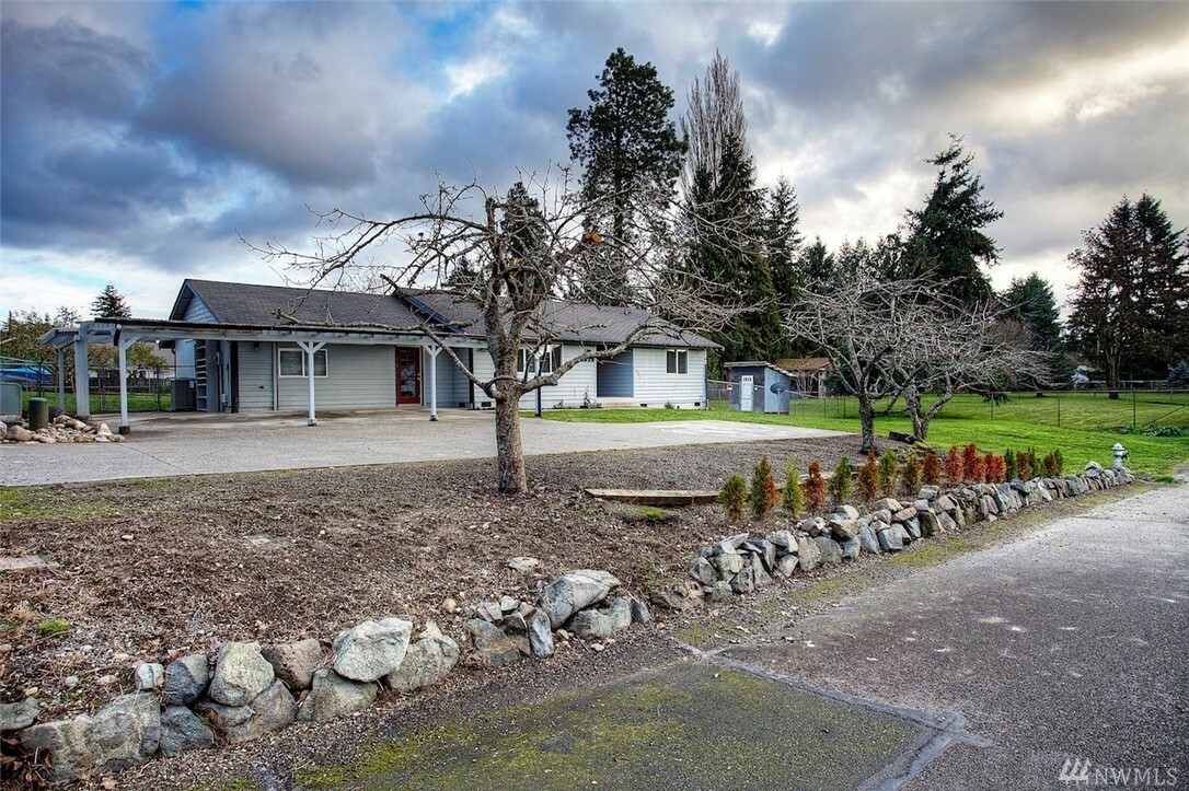 Property Photo:  1020 S 76th St  WA 98408 