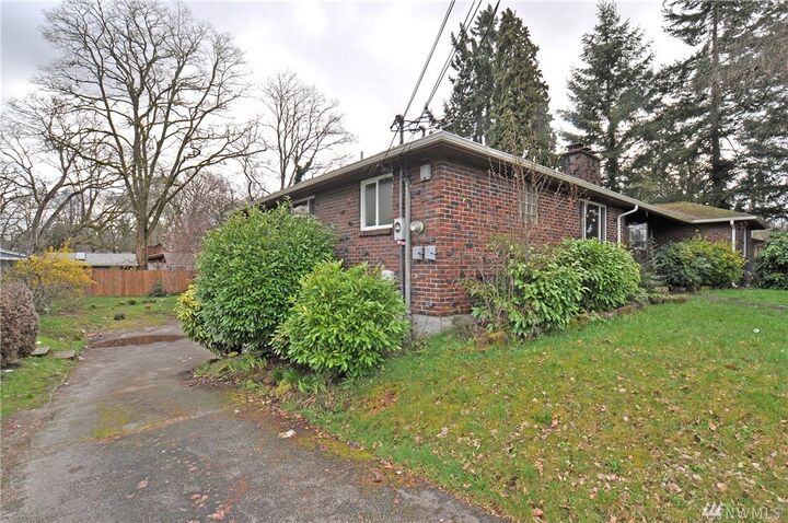 Property Photo:  8409 Bridgeport Wy W  WA 98499 
