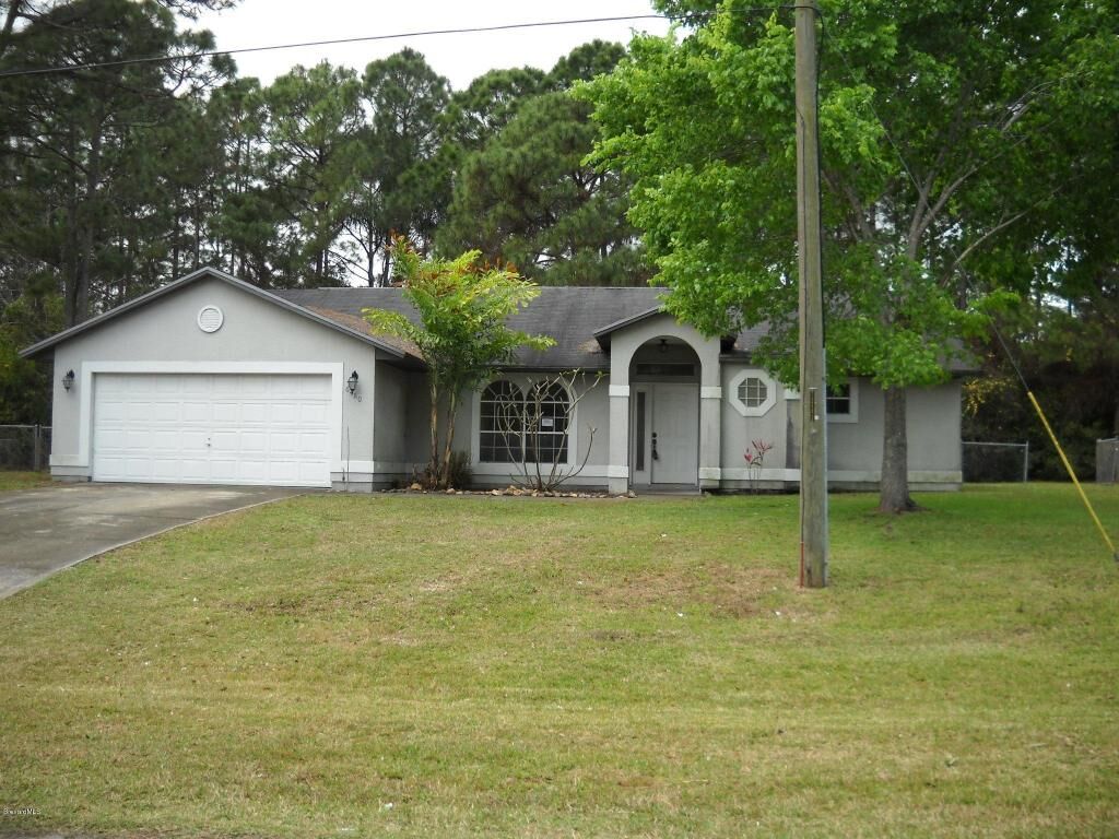 Property Photo:  6480 Golfview Avenue  FL 32927 