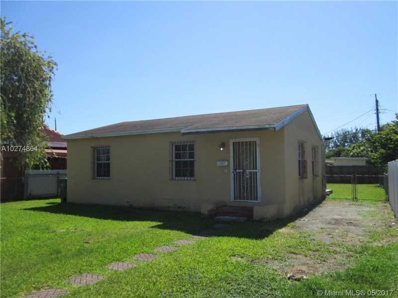 Property Photo:  1850 NW 36th Ave  FL 33125 