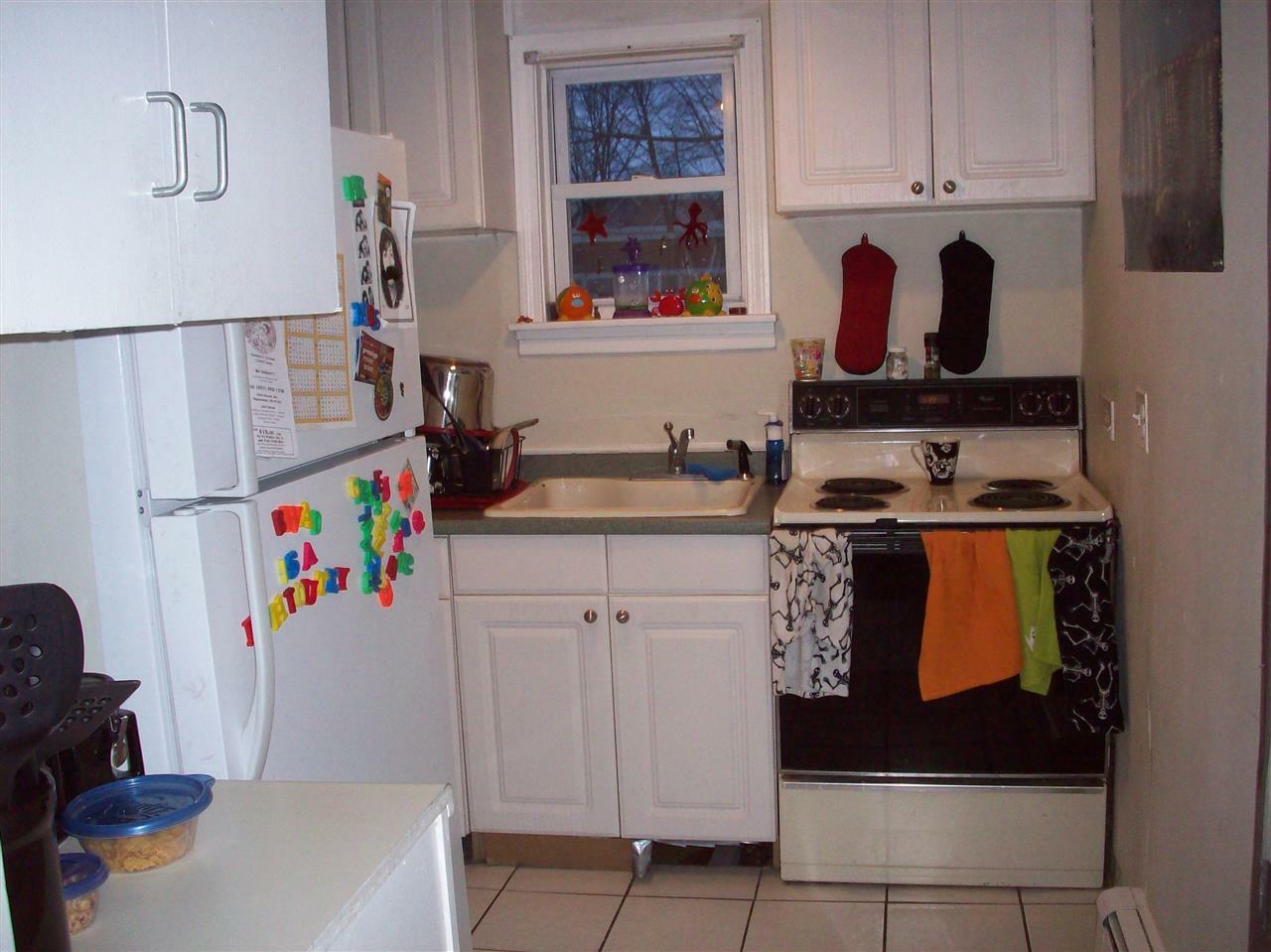 Property Photo:  457 - 459 Spruce Street  NH 03103 