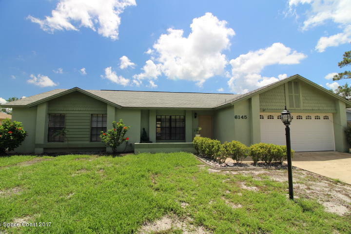 Property Photo:  6145 Ash Avenue  FL 32927 