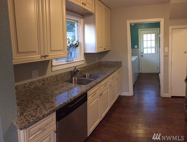 Property Photo: 5037 S Sheridan Ave WA 98408