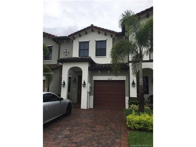 Property Photo: 8820 NW 103 Ave 8820 FL 33178