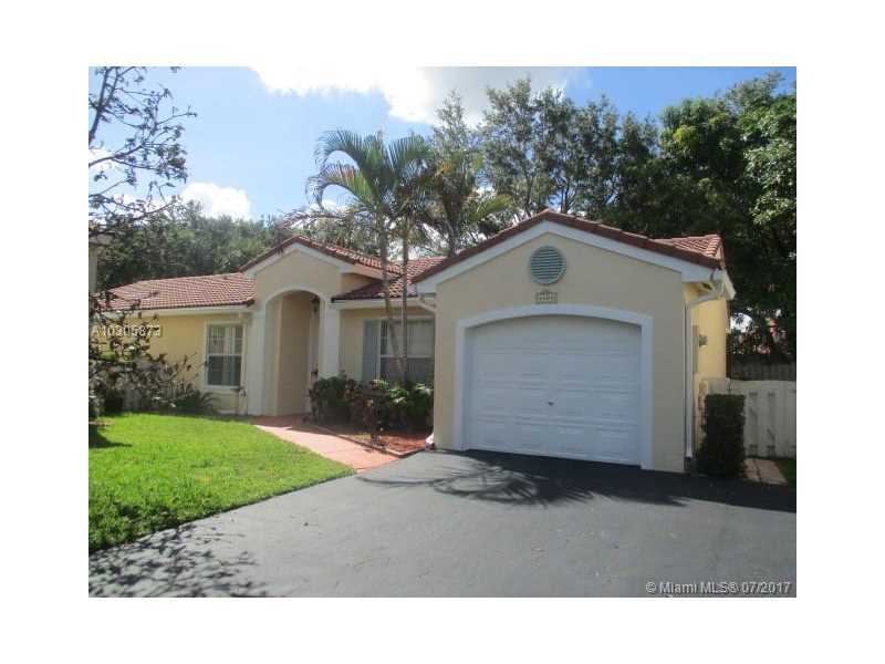 Property Photo: 4400 NW 61st Pl FL 33073