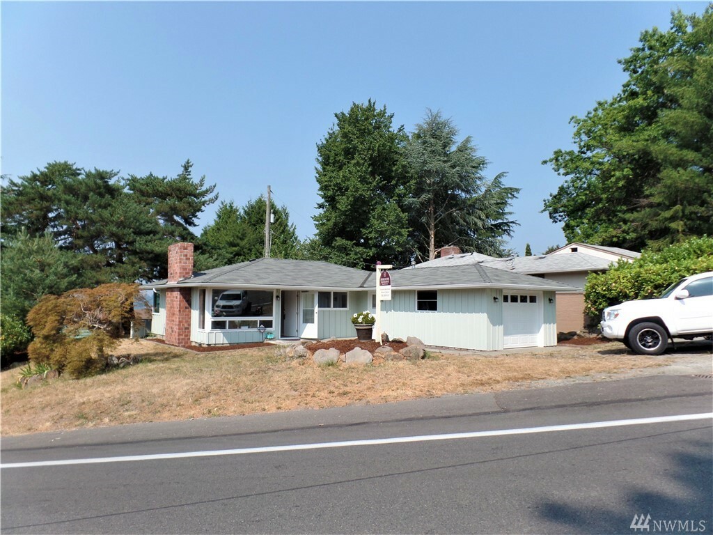 Property Photo:  10650 Cornell Ave S  WA 98178 