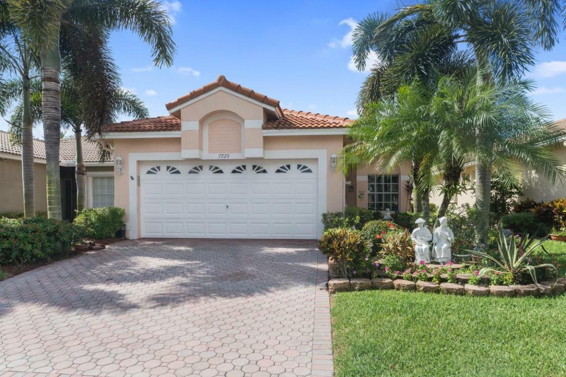 Property Photo: 7720 Cherry Blossom Way FL 33437
