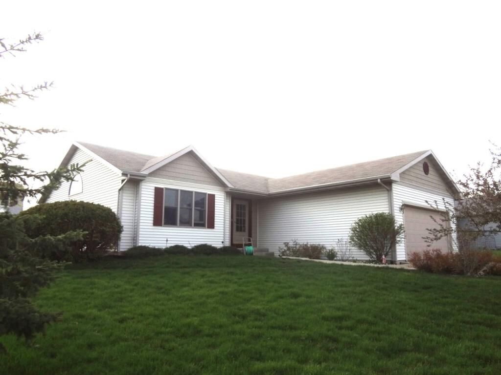 Property Photo:  104 Sanctuary Ct  WI 53038 