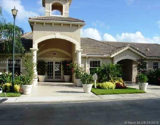 Property Photo:  5025 Wiles Rd 304  FL 33073 