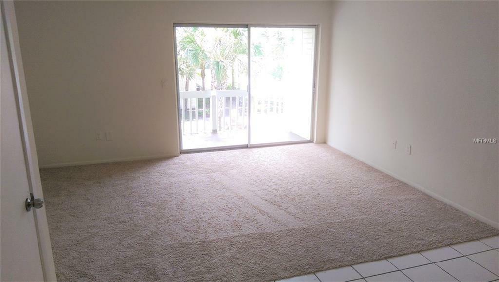 Property Photo:  7921 Kosi Palm Place 201  FL 33615 