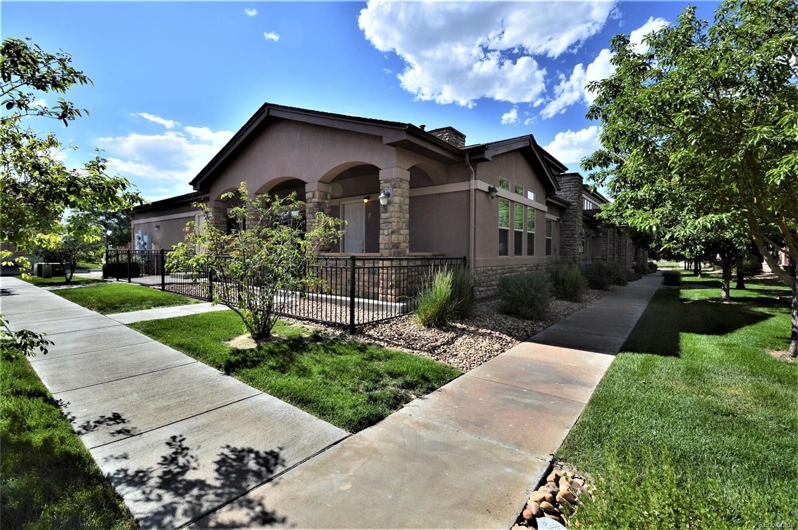 Property Photo: 15501 East 112th Avenue Unit 28F CO 80022