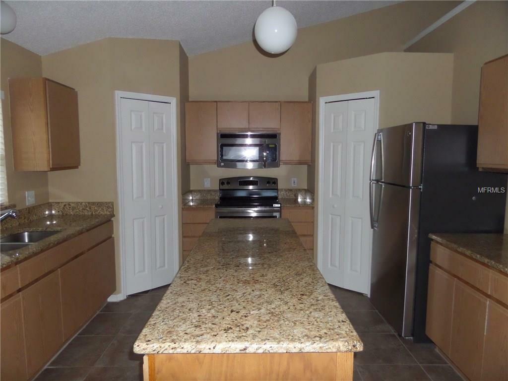 Property Photo:  14006 Amero Lane  FL 34609 