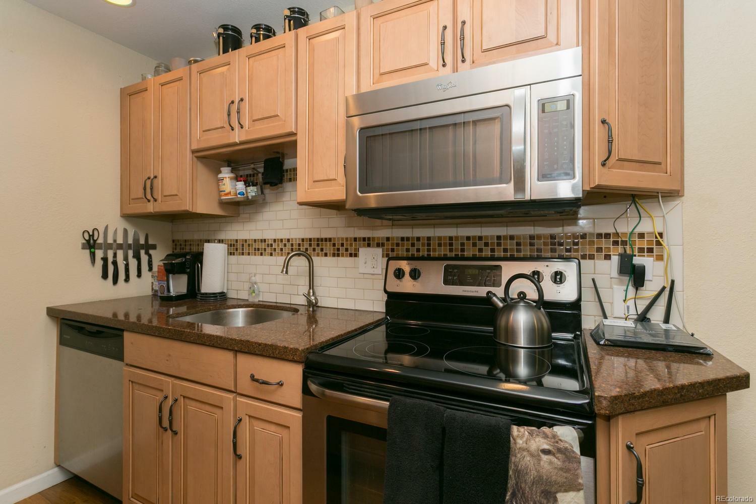 Property Photo:  3351 South Monaco Parkway Unit B  CO 80222 