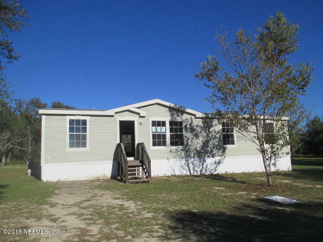 Property Photo:  6809 Deer Springs Rd  FL 32656 