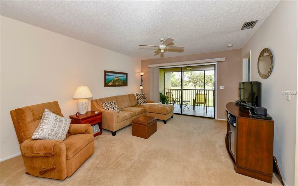 Property Photo:  5765 Avista Drive 4164  FL 34243 