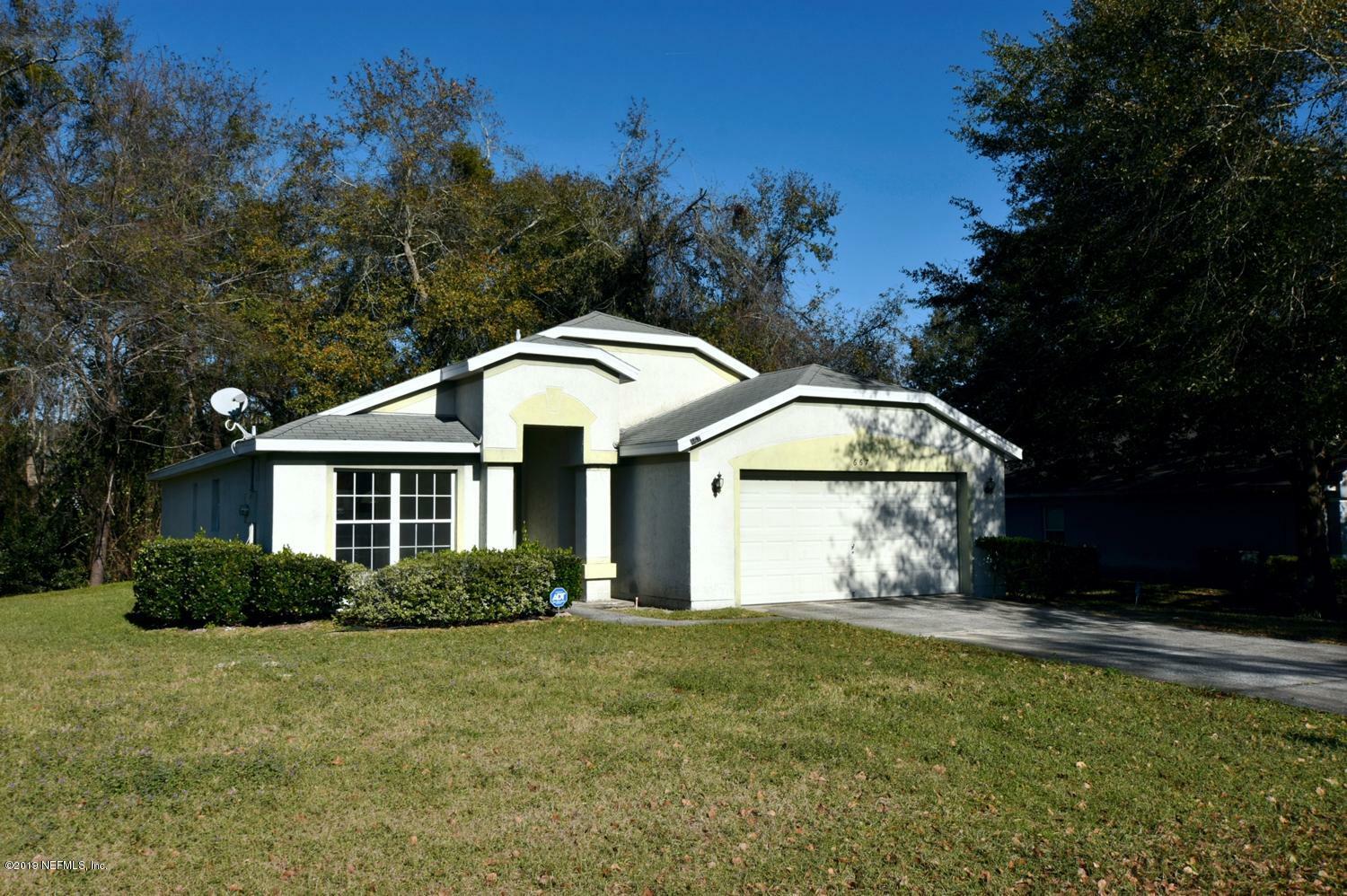 Property Photo:  667 Cherry Bark Drive N  FL 32218 