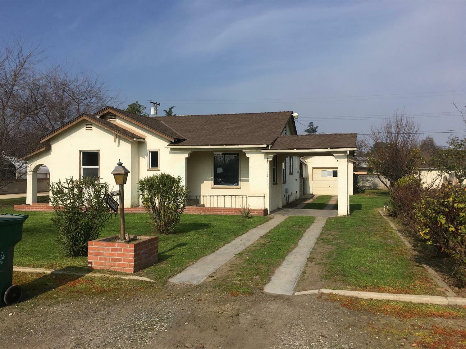 Property Photo:  4965 E Washington Avenue  CA 93727 