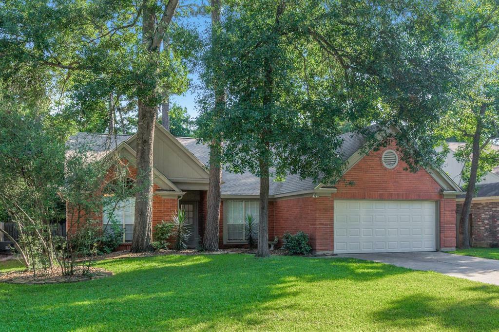 Property Photo:  114 S Village Knoll Circle  TX 77381 