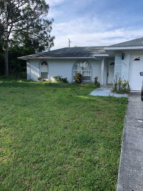 Property Photo: 1691 NW Jacobin Street NW FL 32907