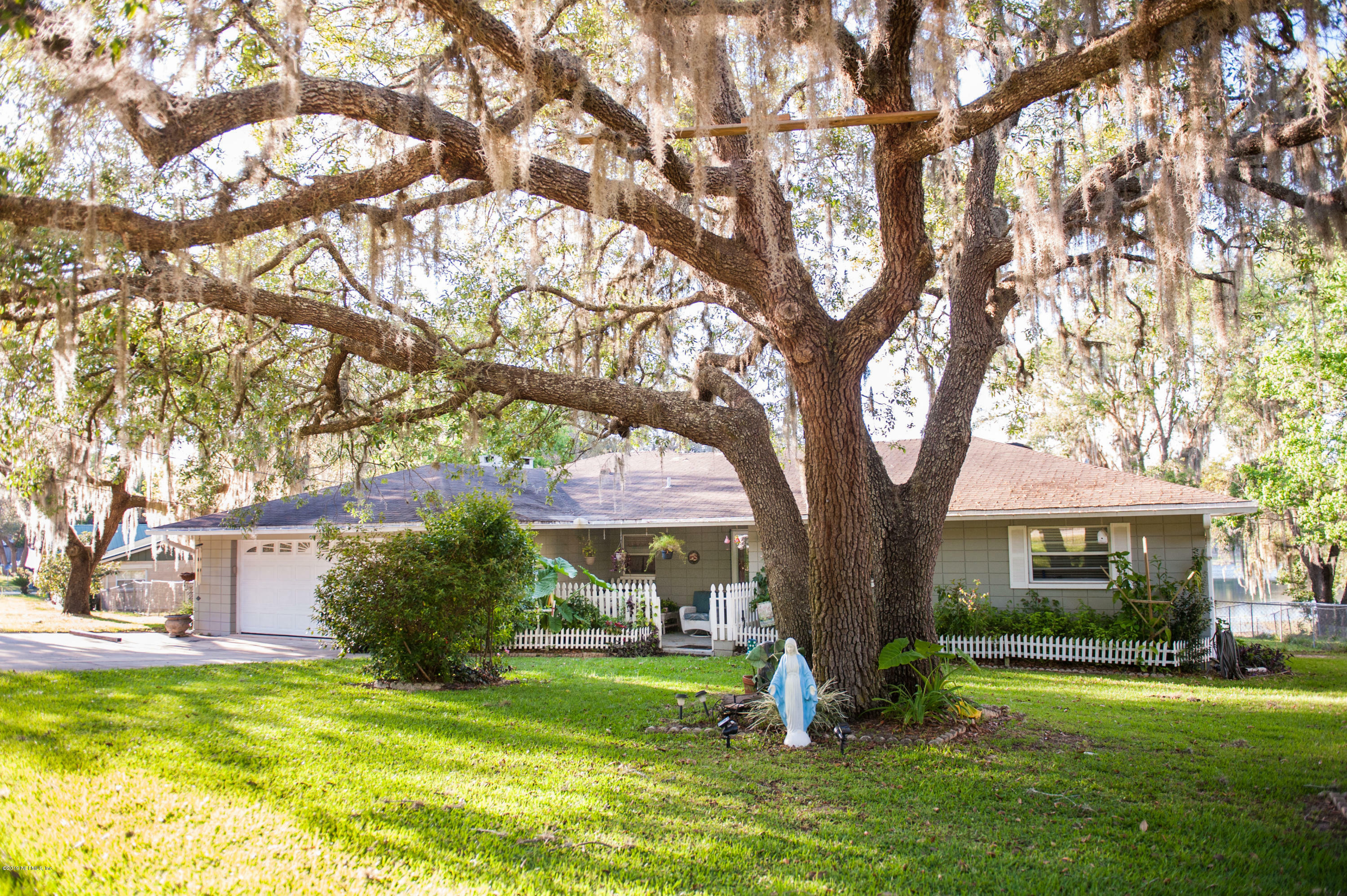 Property Photo:  6433 Loch Lommond Drive  FL 32656 