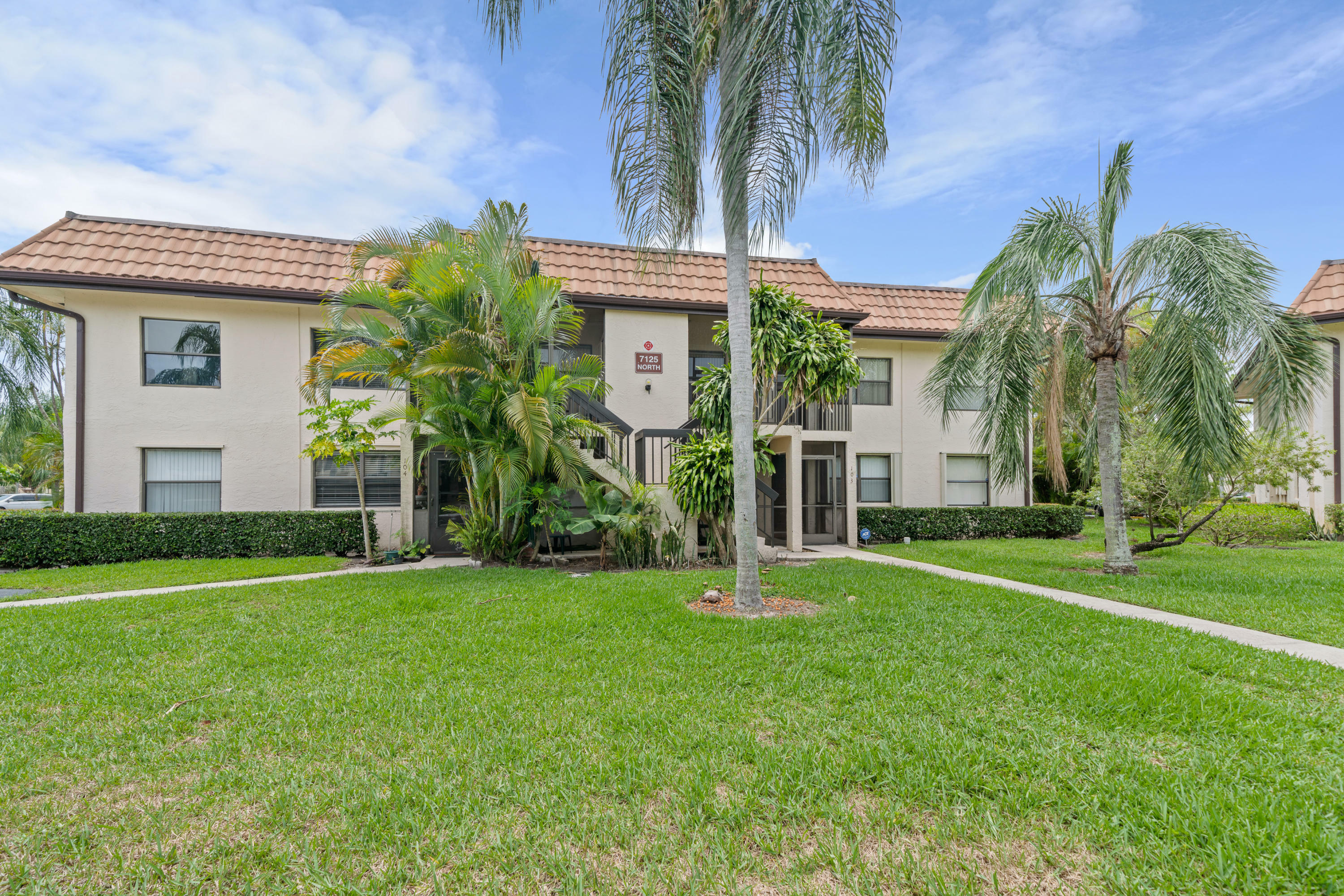 Property Photo: 7125 Golf Colony Court 203 FL 33467