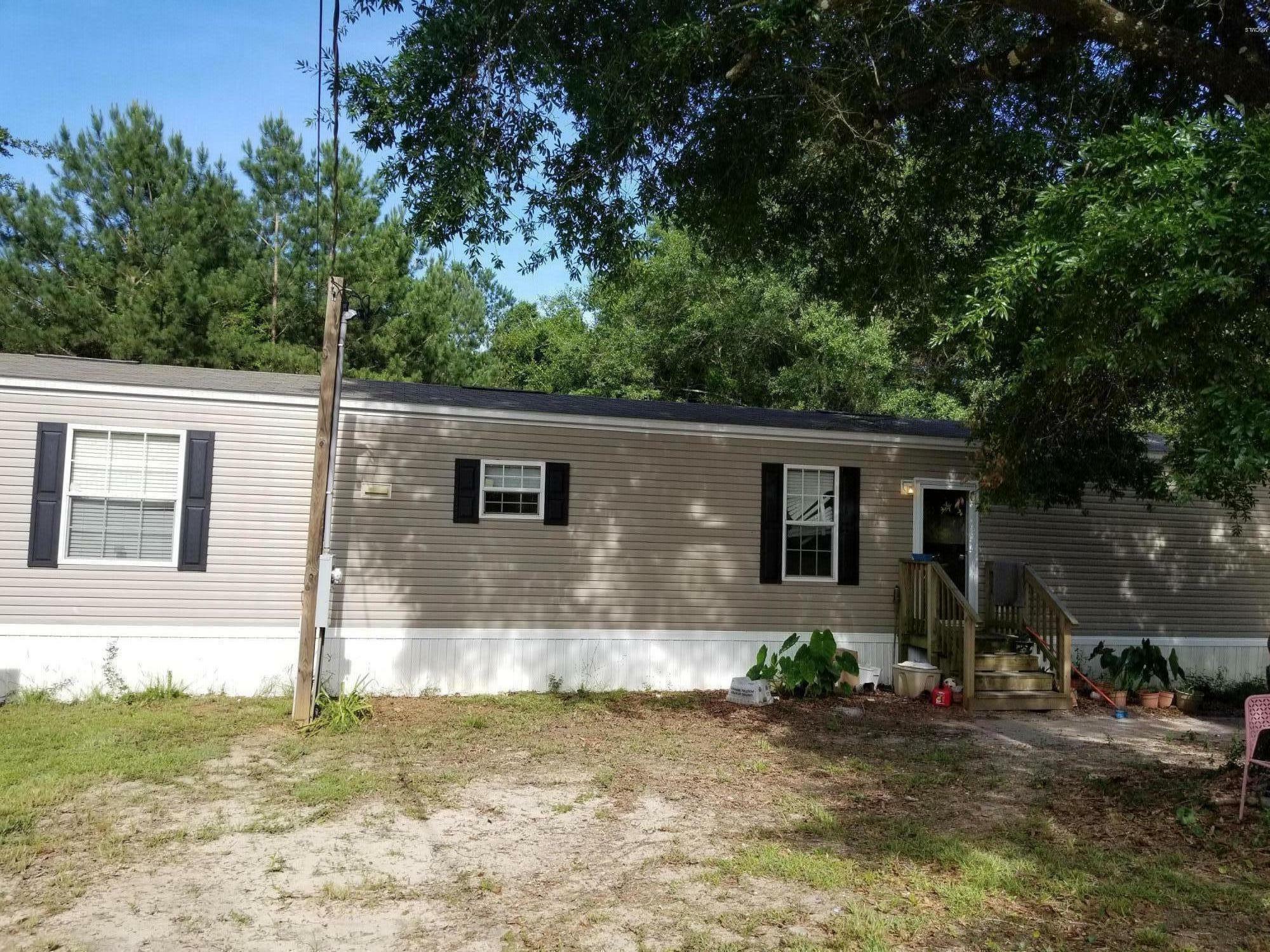 Property Photo: 9248 N Pine Drive MS 39571