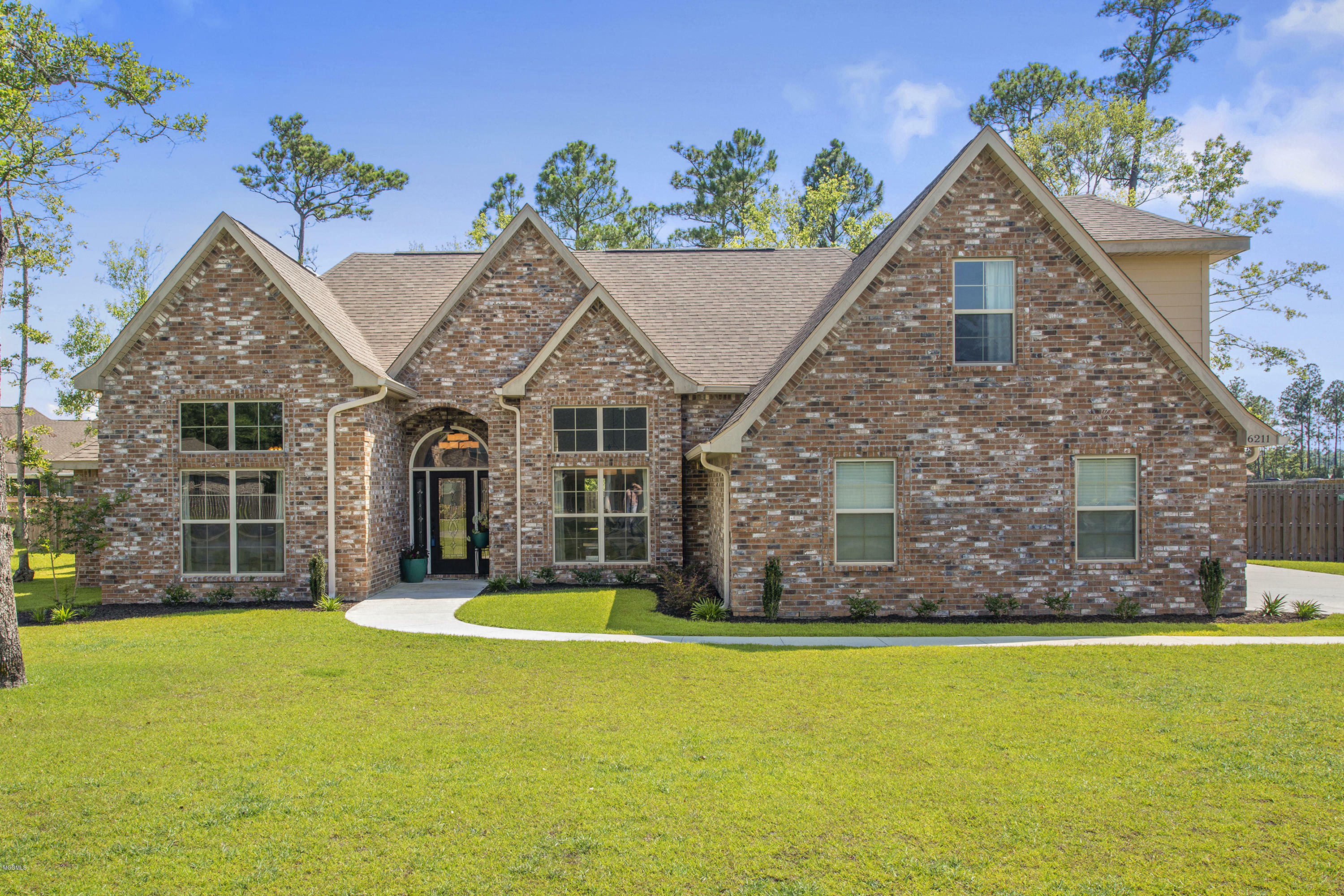 Property Photo:  6211 Palmetto Pointe Drive  MS 39564 