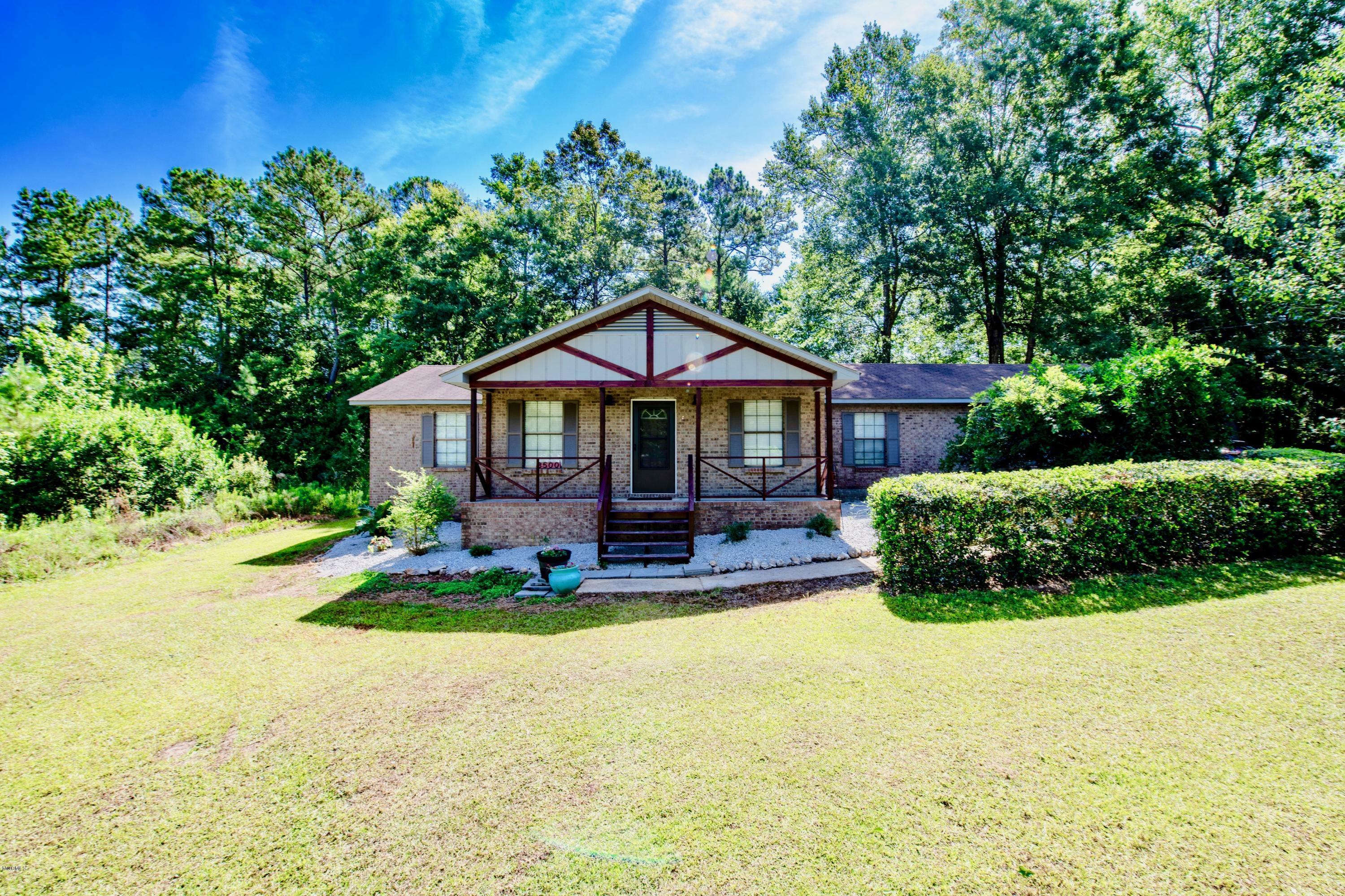 Property Photo:  8500 Martin Bluff Road  MS 39553 