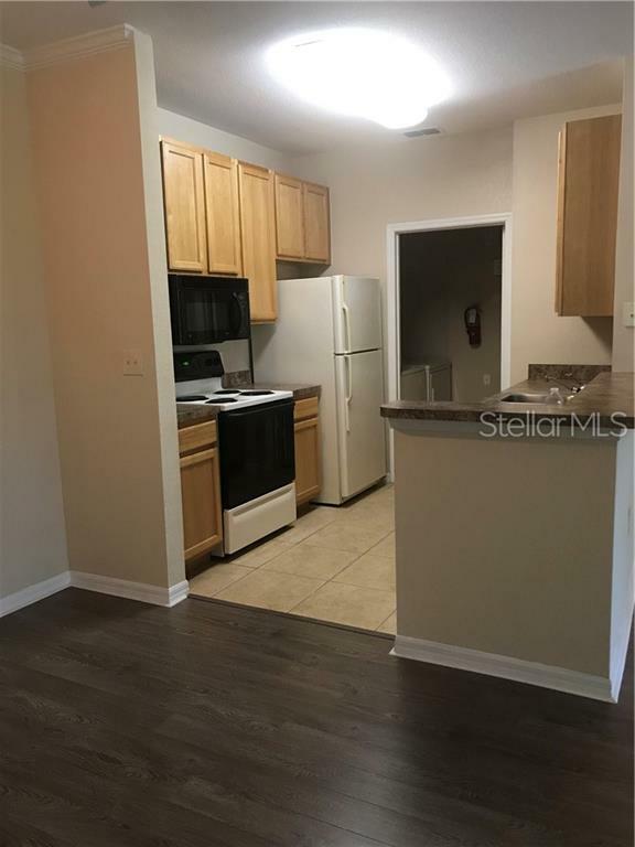 Property Photo:  2404 Courtney Meadows Court 203  FL 33619 