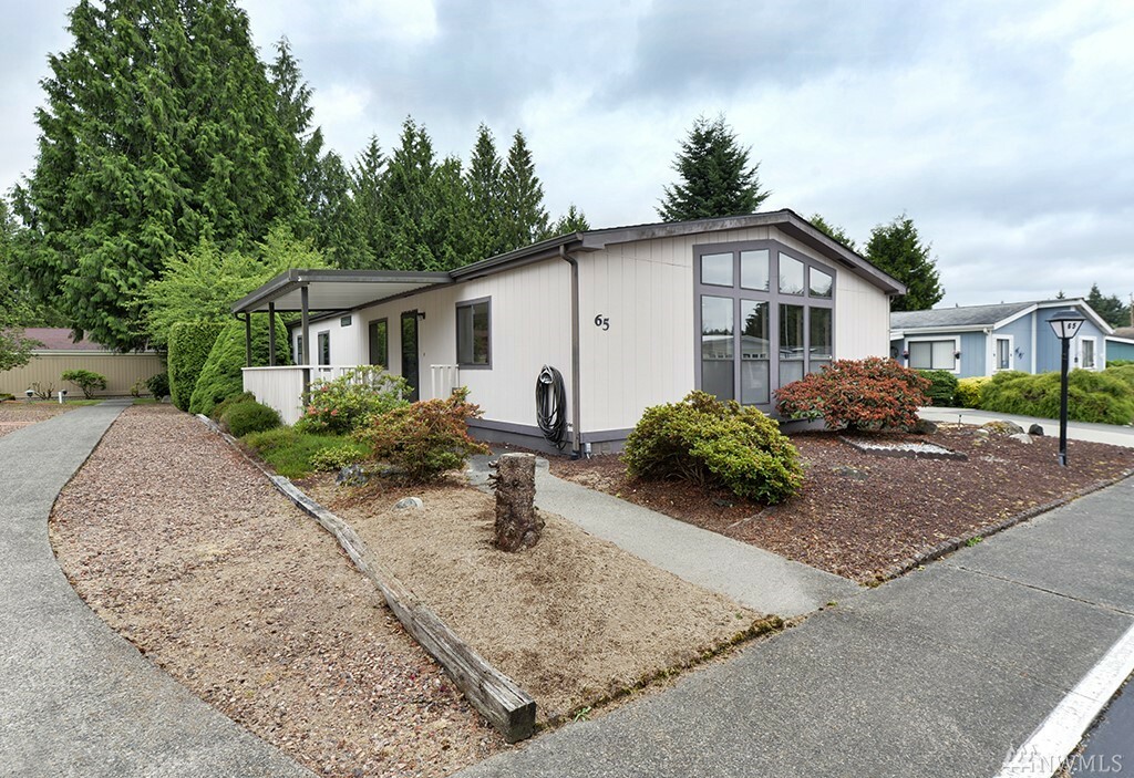 Property Photo: 37301 28th Ave S 65 WA 98003