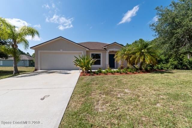Property Photo: 3056 Tropical Circle SE FL 32909