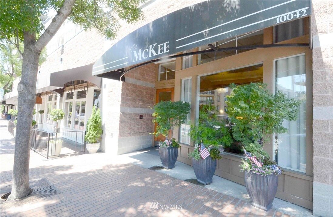 Property Photo: 10042 Main Street 306 WA 98004