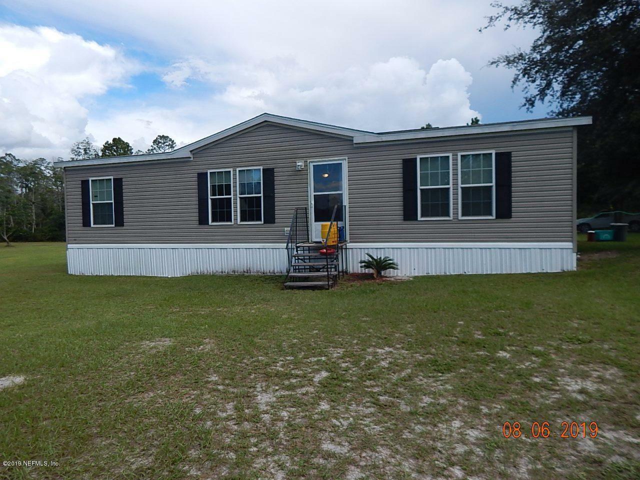 Property Photo:  112 S East St  FL 32148 