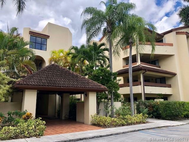 Property Photo:  8810 SW 123rd Ct M402  FL 33186 