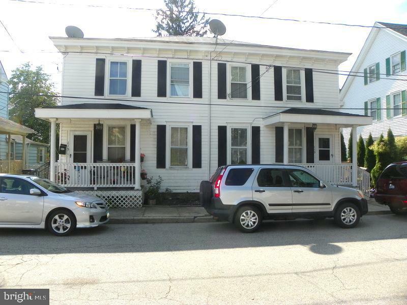 Property Photo: 113/115 S Delaware Street DE 19977