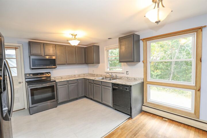 Property Photo:  85 Comeau Street  NH 03102 