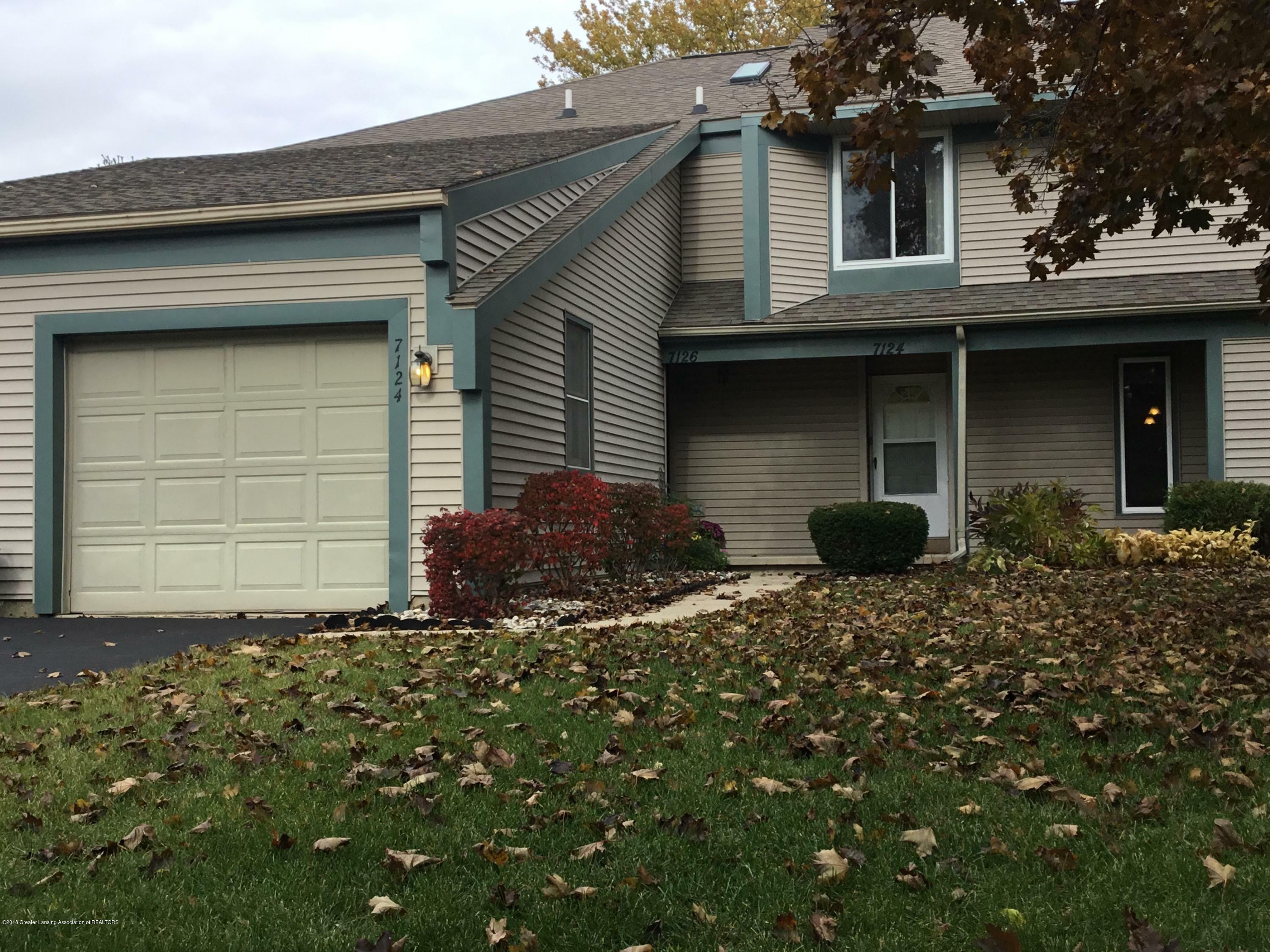 Property Photo:  7124 Creekside Drive  MI 48917 